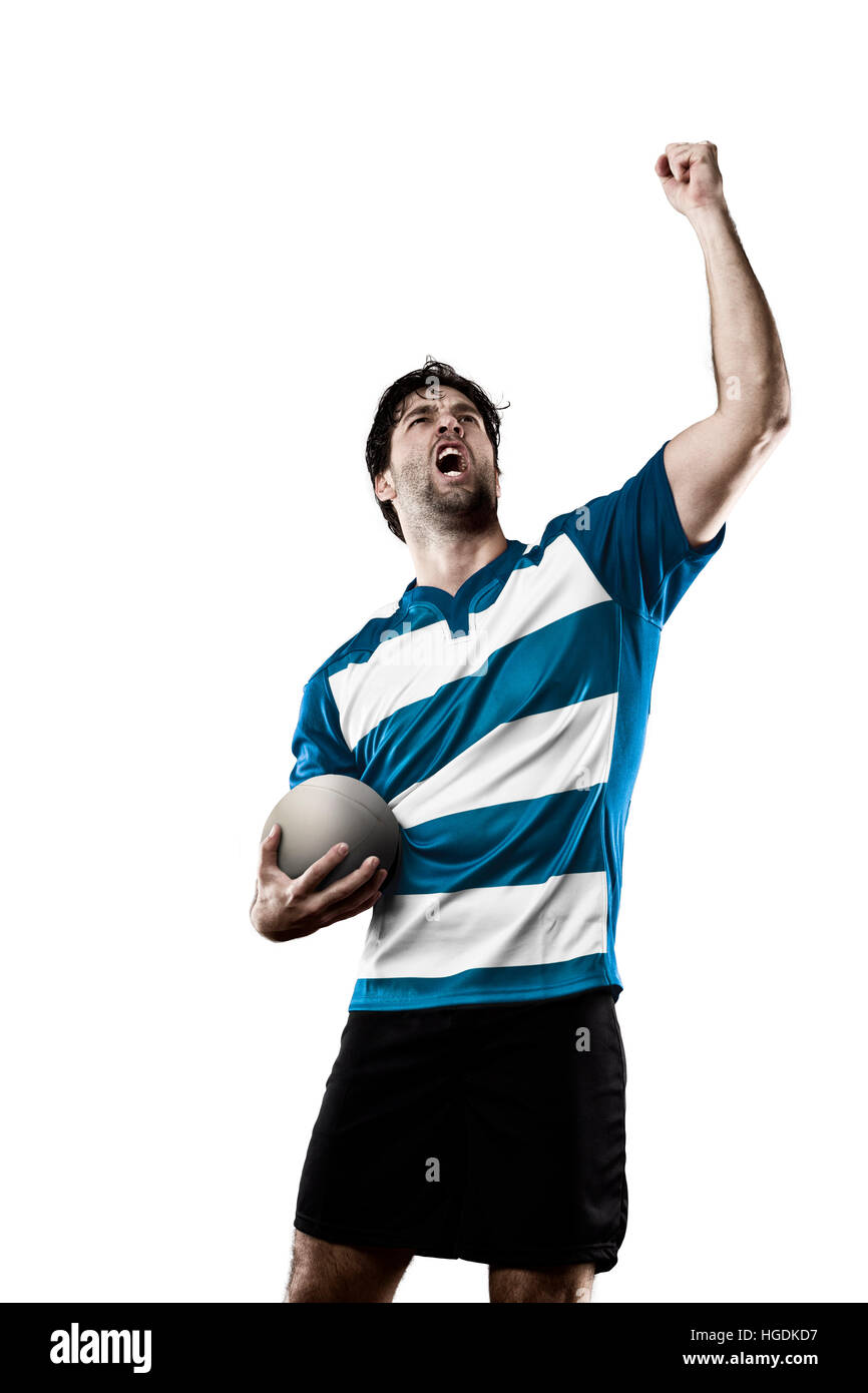Rugby player in a blue uniform celebrating. White Background Stock Photo