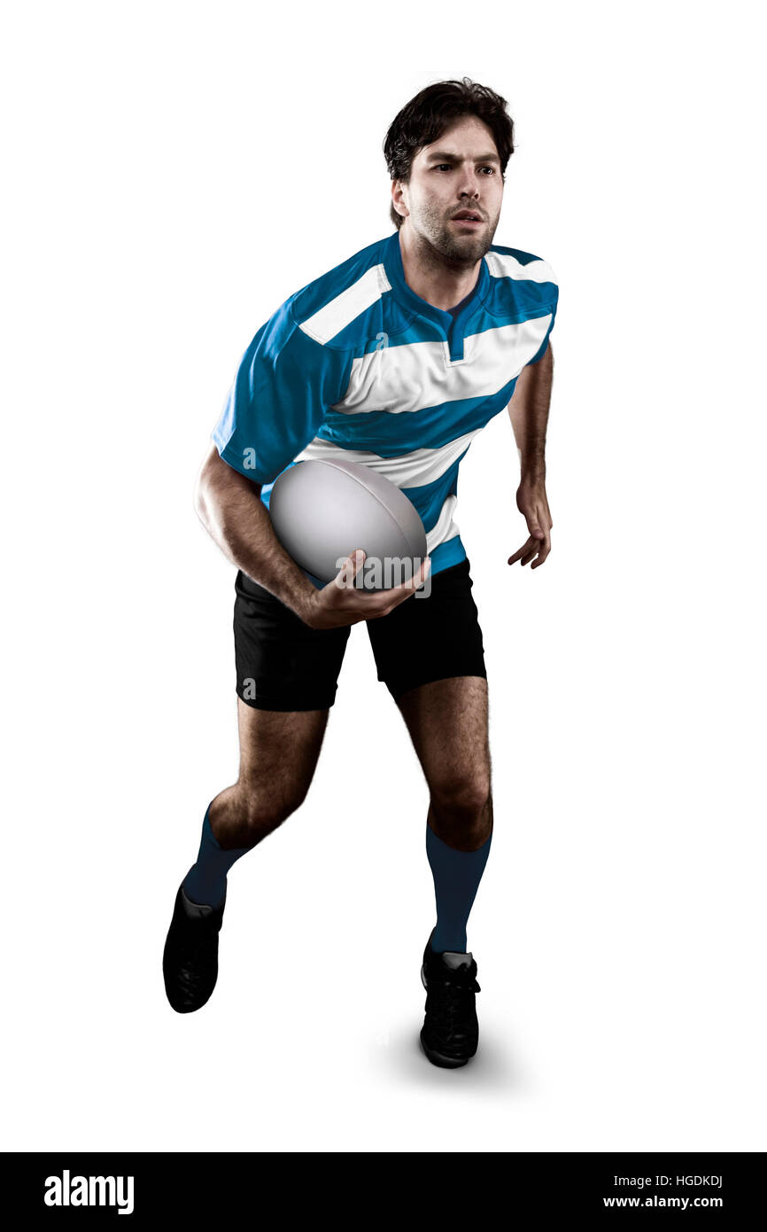 Rugby player in a blue uniform running. White Background Stock Photo