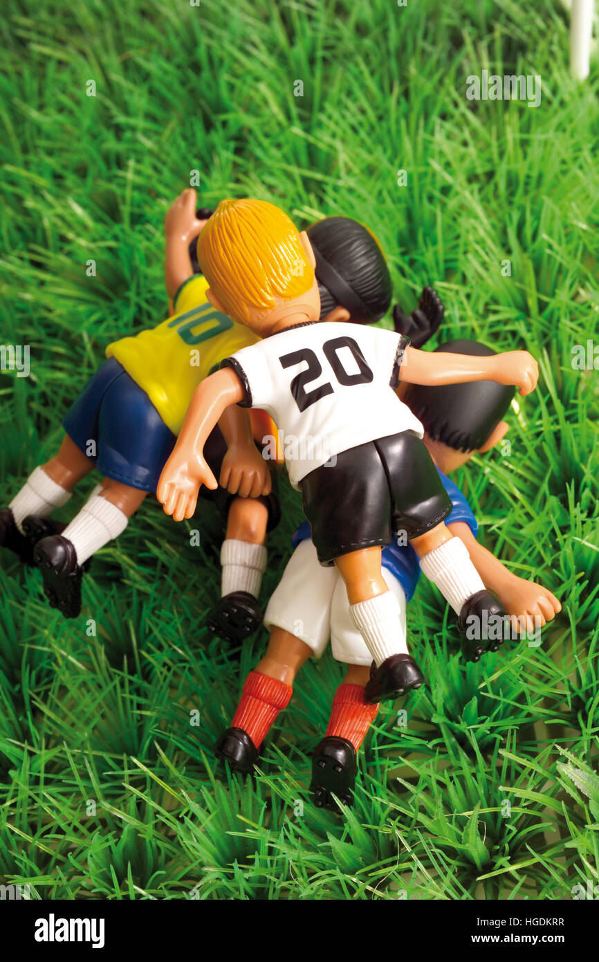 Football players in a rush of joy Stock Photo Alamy