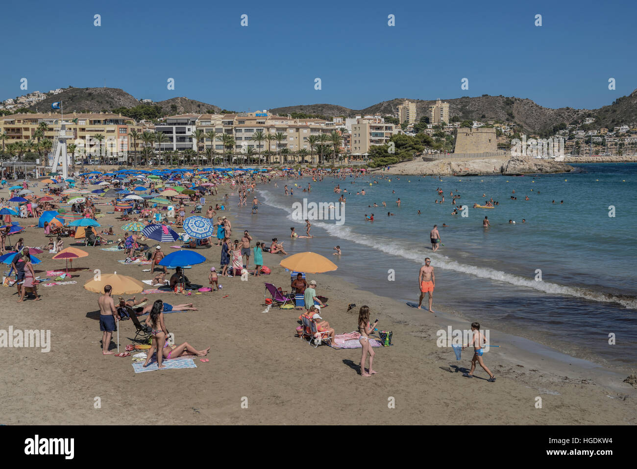 Platja de L'Ampolla Beach with fortress, Moraira, Alicante, Costa Blanca, Spain Stock Photo