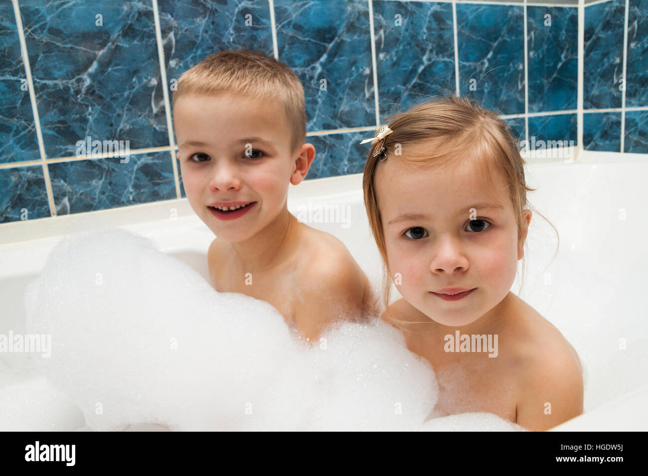 boy and girl bathing