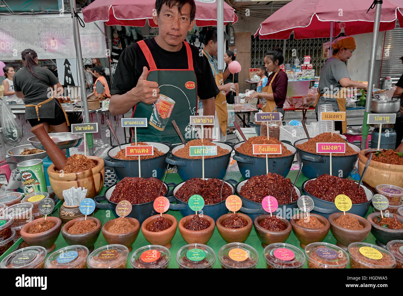 Thai street food market stall and spice vendor with an array of various