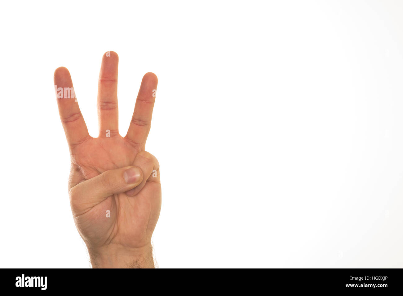 Hand showing three fingersfor counting and indicating numbers. Stock Photo