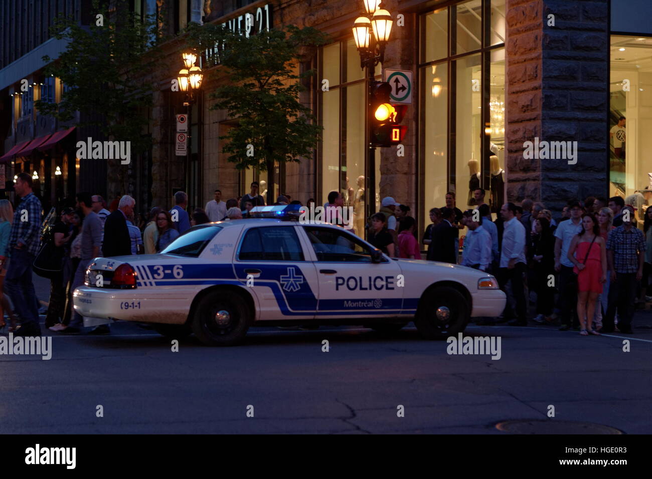 A police cruiser parked on Ste-Catherine street in the heart of downtown Montreal, Quebec Stock Photo