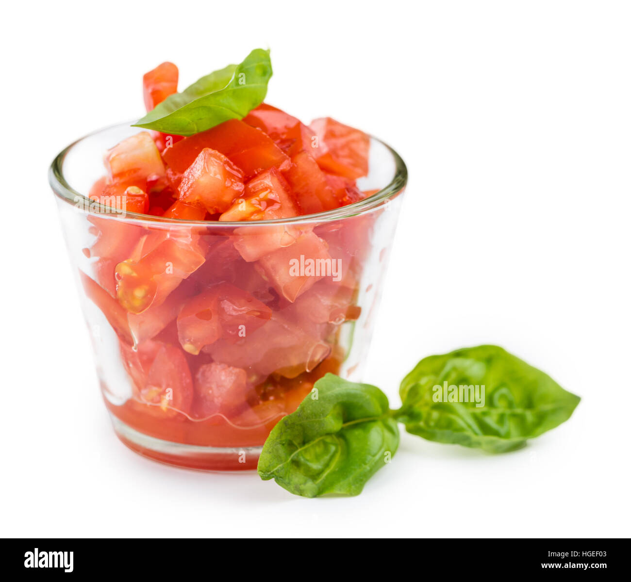 Portion of Diced Tomatoes (as closeup shot) isolated on white