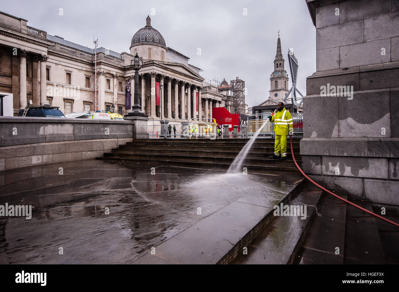 Clearing up Trafalgar Square on New Year's Day after the New Year's Eve celebrations in front of the National Gallery Stock Photo