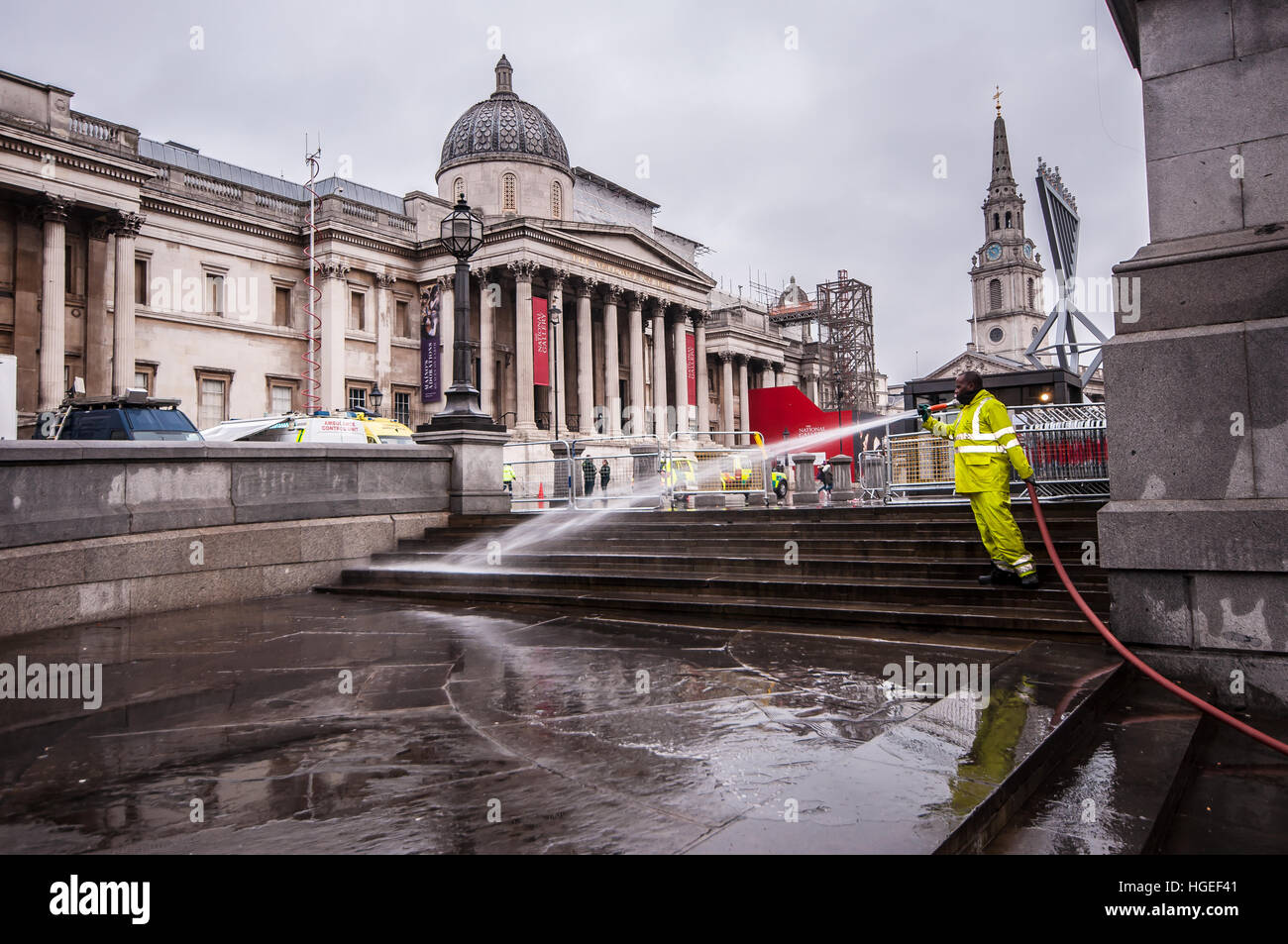 Clearing up Trafalgar Square on New Year's Day after the New Year's Eve celebrations in front of the National Gallery Stock Photo