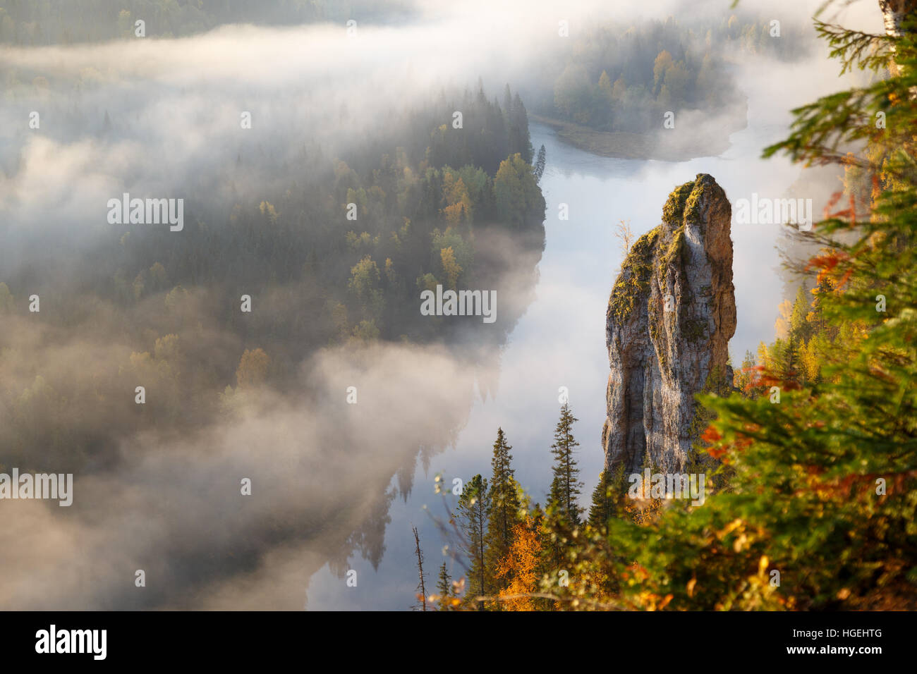 usva river devils finger rock, autumn colors, russian nature, misty morning Stock Photo