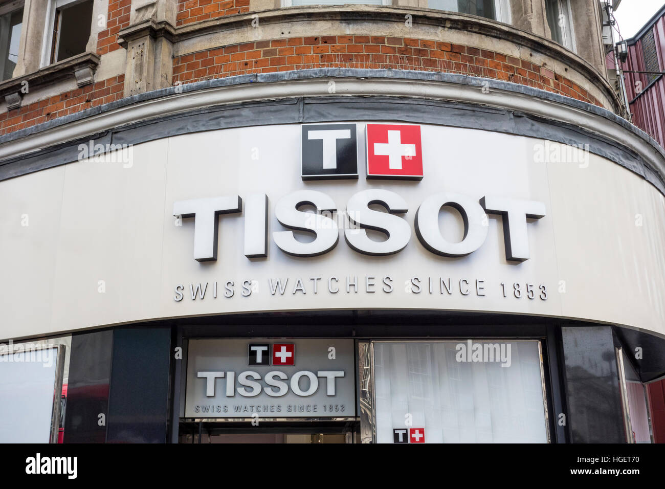 Tissot retailer store shop sign on Oxford Street, London, UK Stock Photo