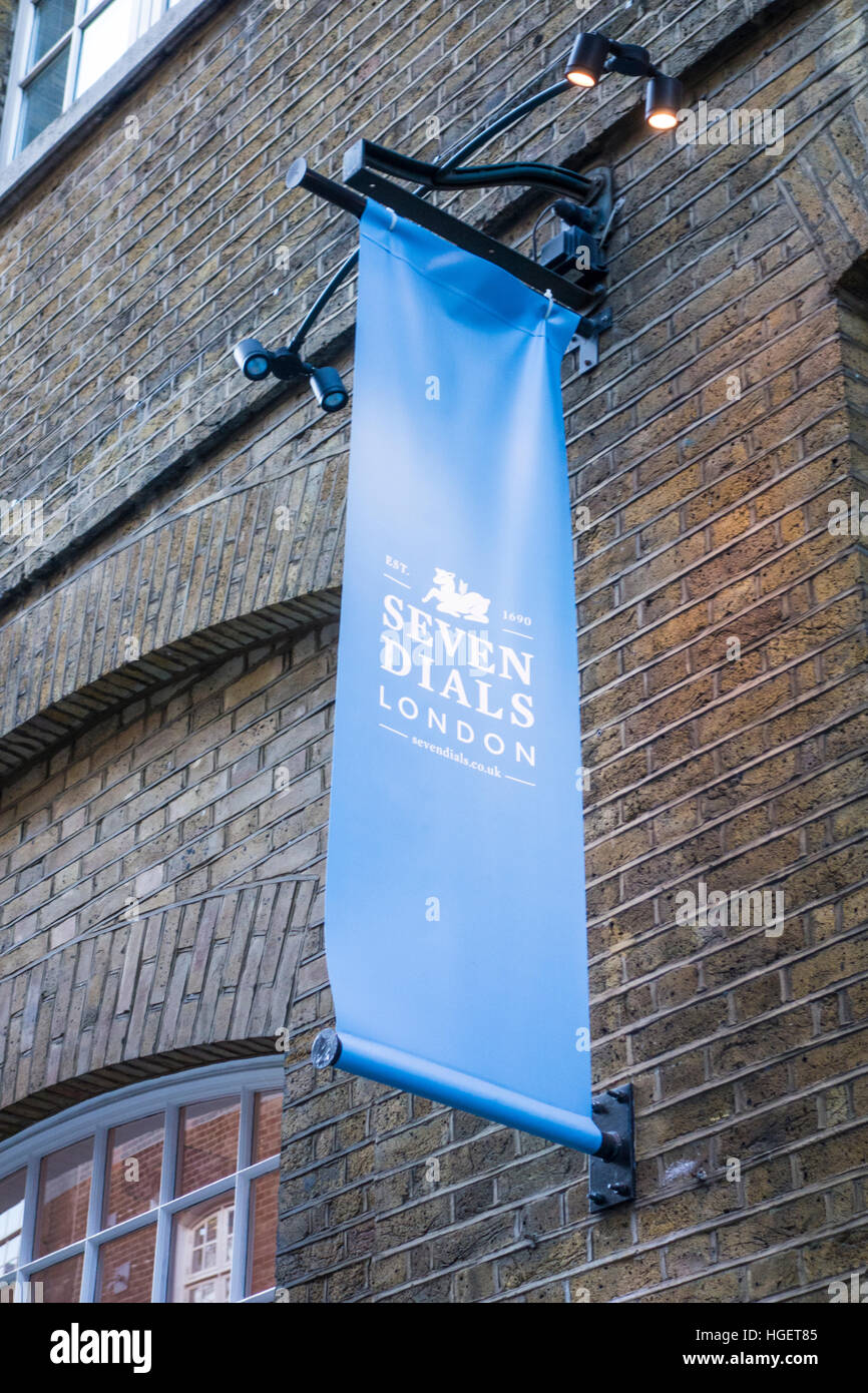 Sign or banner in the Seven Dials area of London near Covent Garden. UK Stock Photo