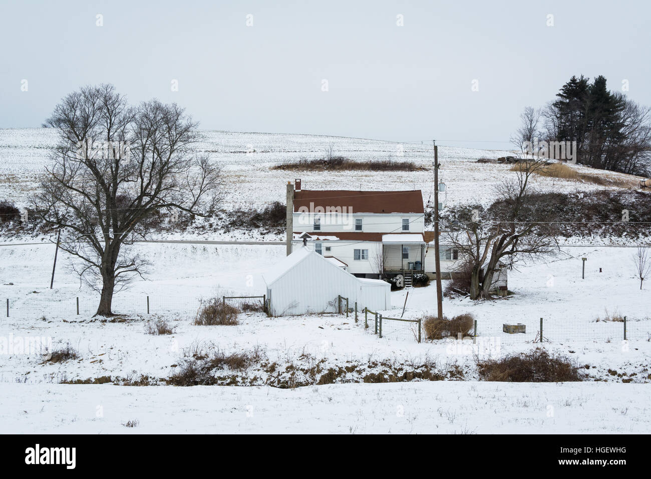 View of a snow covered farm, near Jefferson, Pennsylvania. Stock Photo