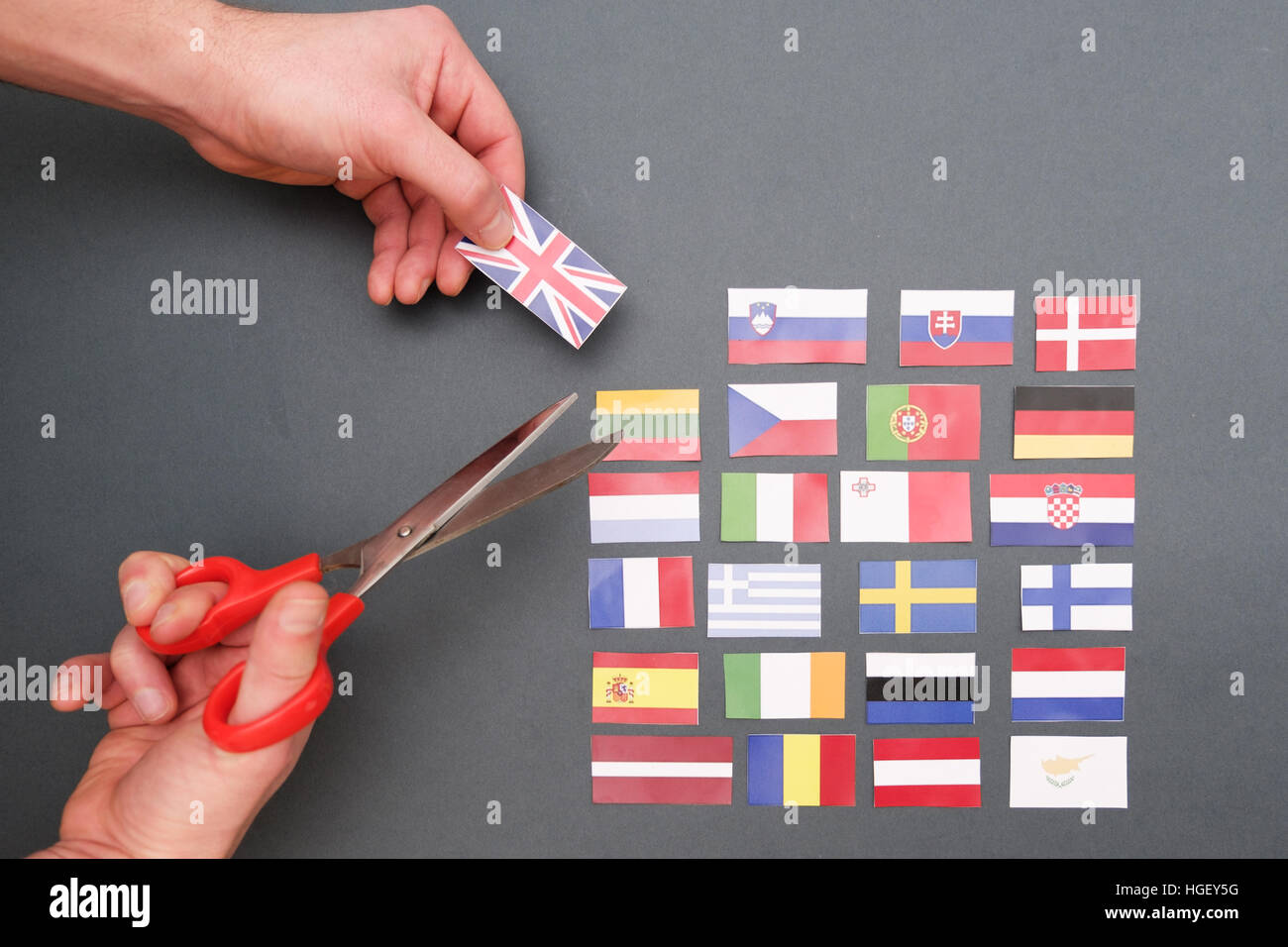 European flags and great britain flag on hands Stock Photo
