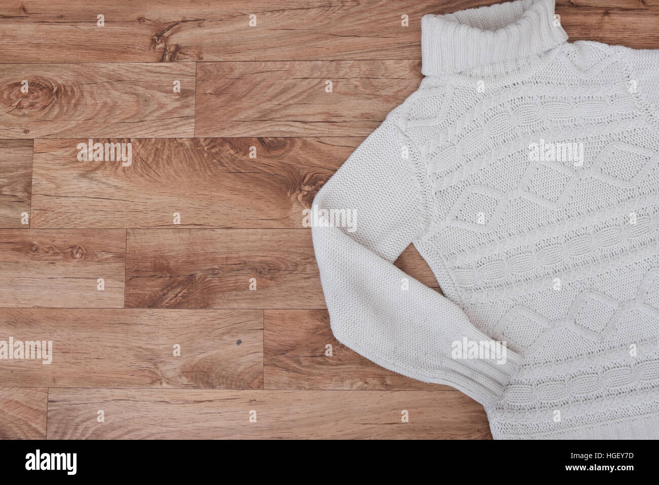 Winter clothing top view on wooden Stock Photo
