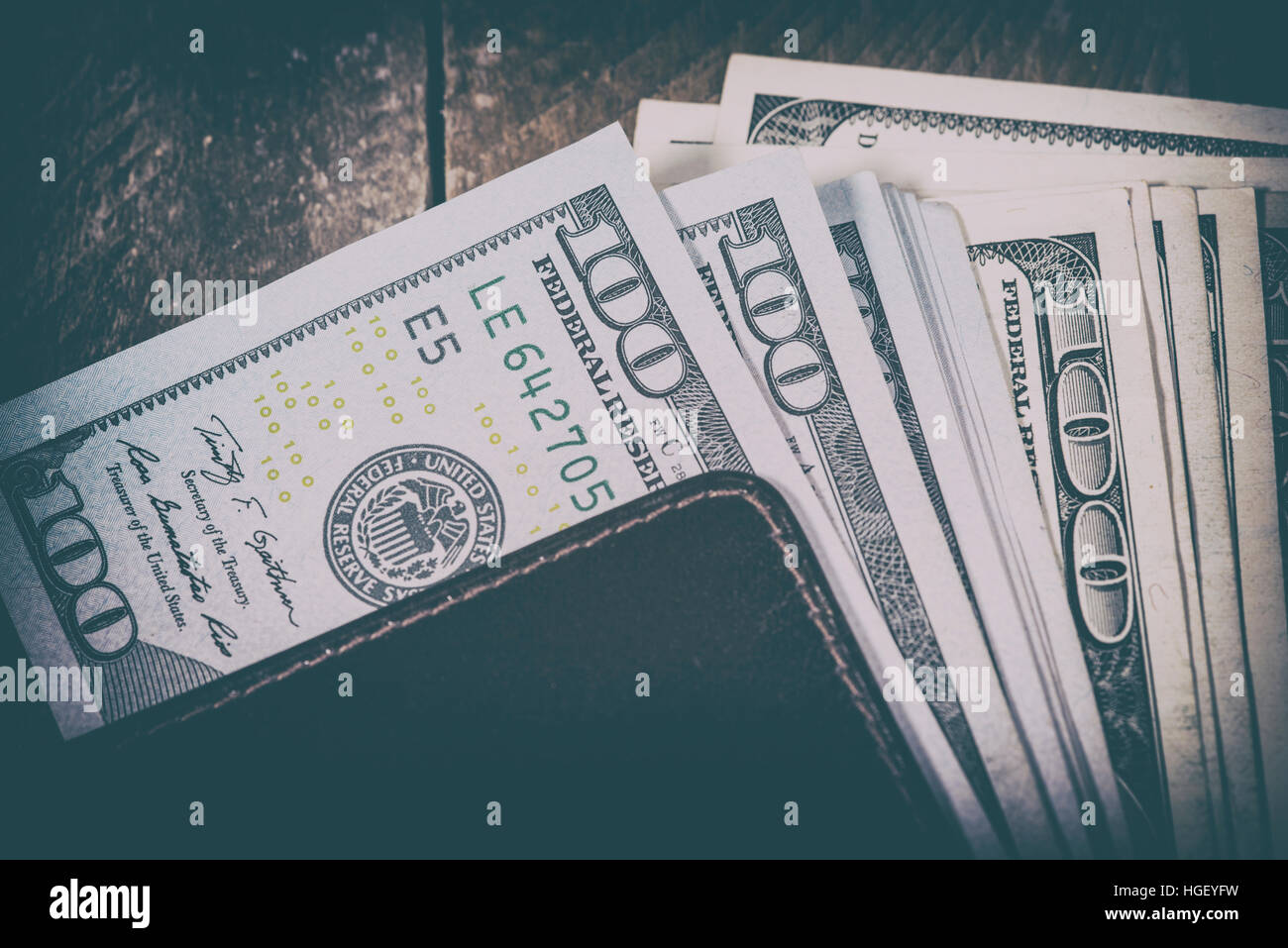 a wallet full of dollars Stock Photo - Alamy