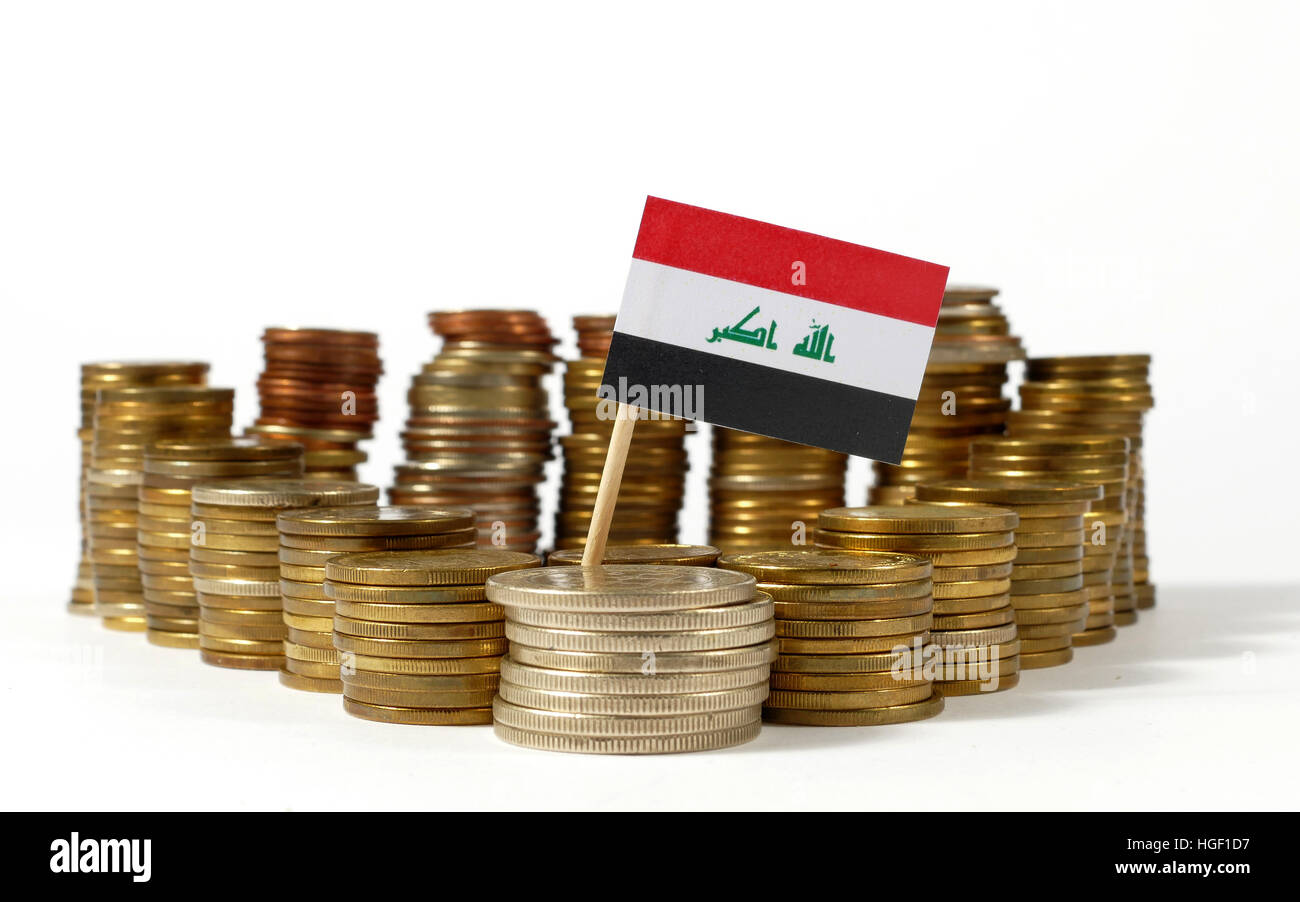 Iraq flag waving with stack of money coins Stock Photo