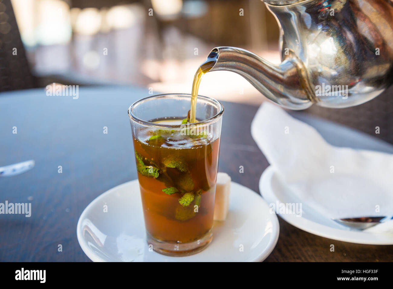 Traditional mint tea, also known as Berber whiskey. Teahouse in Sidi Ifni, Morocco. Stock Photo