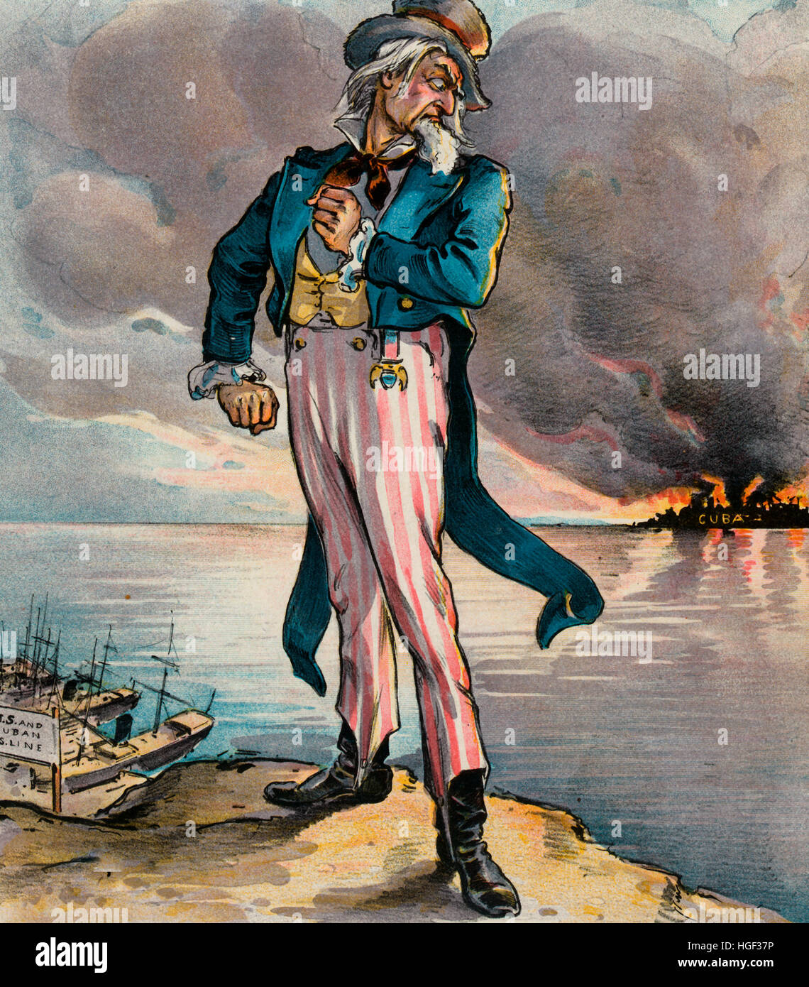 Time nearly up - Political cartoon shows Uncle Sam standing on American soil next to the docks of the 'U.S.A. and Cuban S.S. Line', looking over his shoulder at Cuba in flames. 1897 Stock Photo