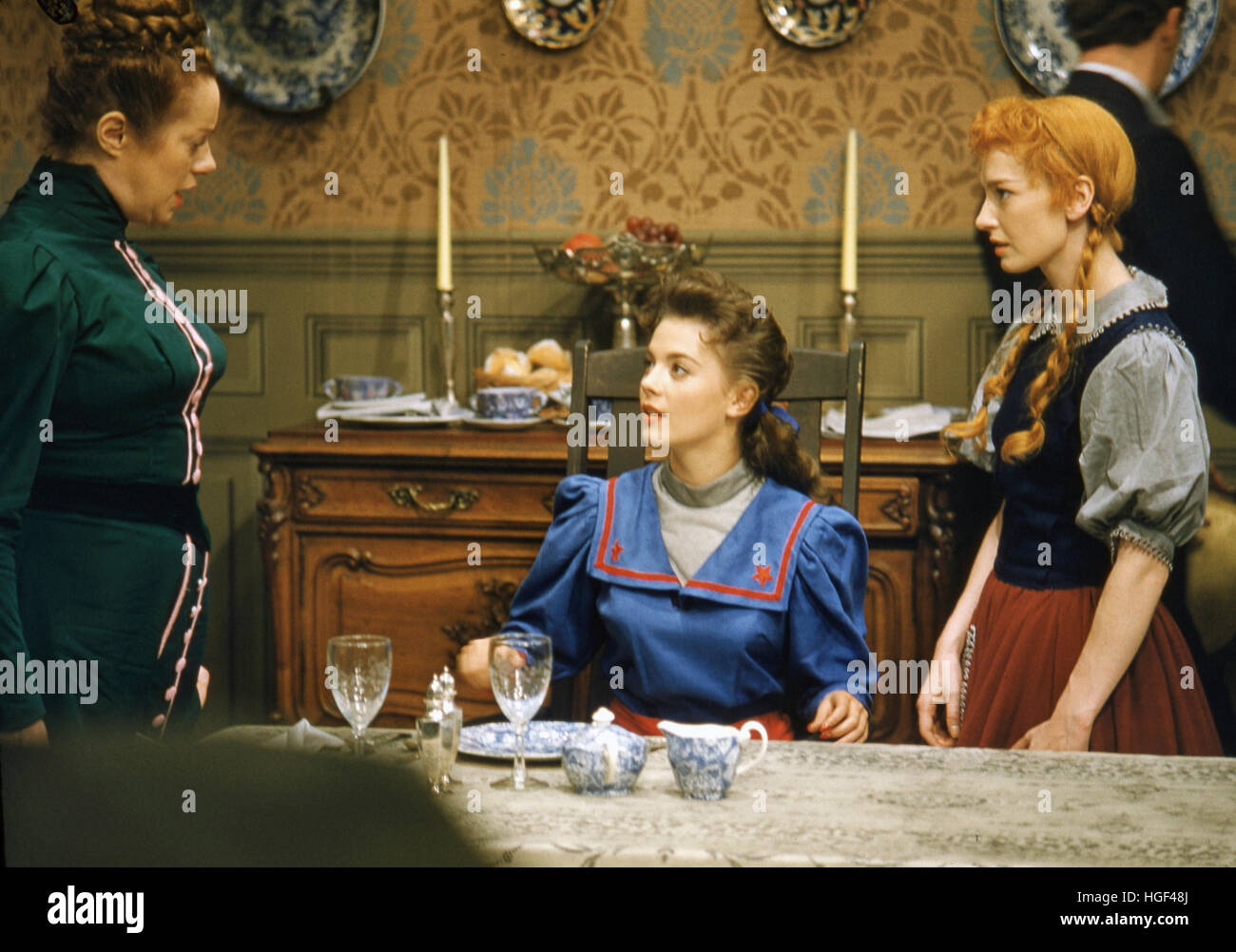 Elsa Lanchester (standing at left), Natalie Wood, and Jeannie Carson, in the 1955 Max Liebman television production of Heidi. Stock Photo