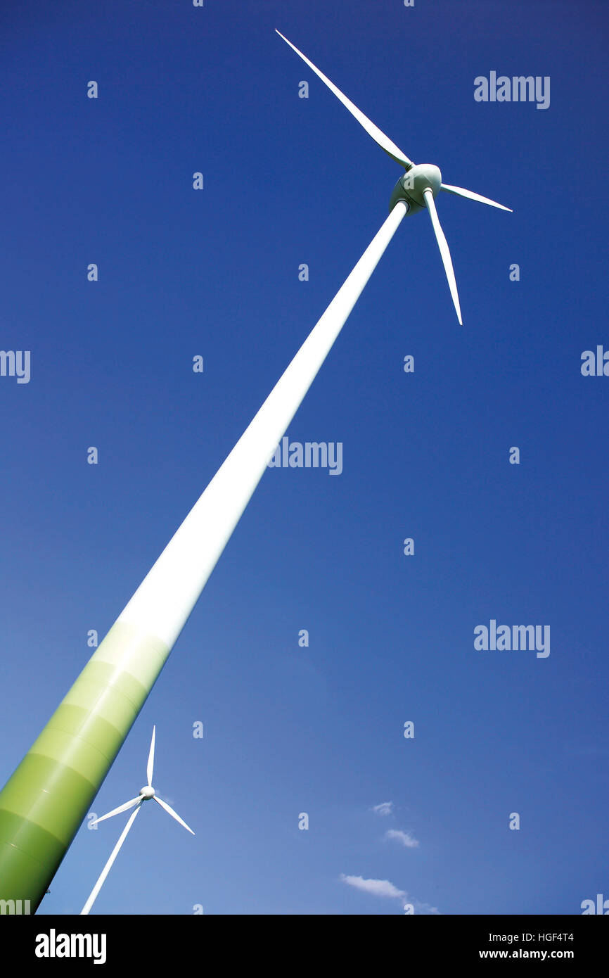 Wind turbines against a blue sky Stock Photo - Alamy