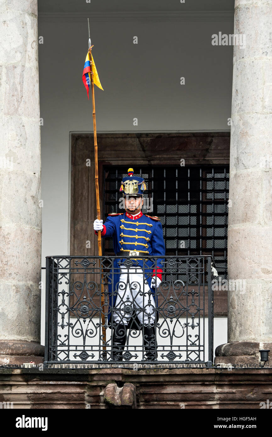 Soldier of the Presidential Guard keeps watch on balcony, Carondelet Presidential Palace, Quito, Ecuador Stock Photo