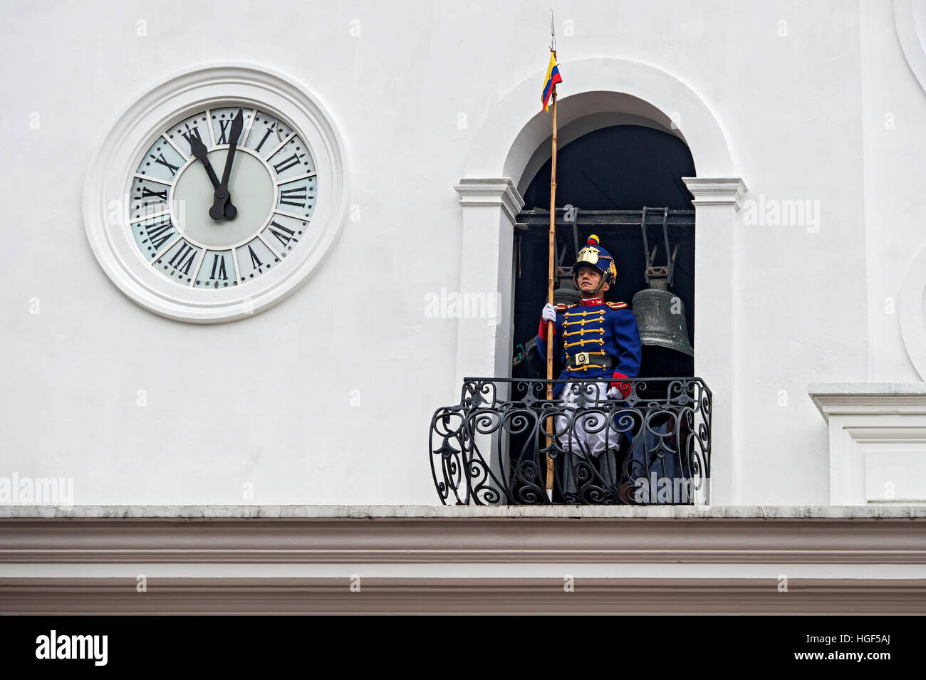 Soldier of the Presidential Guard keeps watch on balcony, Carondelet Presidential Palace, Quito, Ecuador Stock Photo