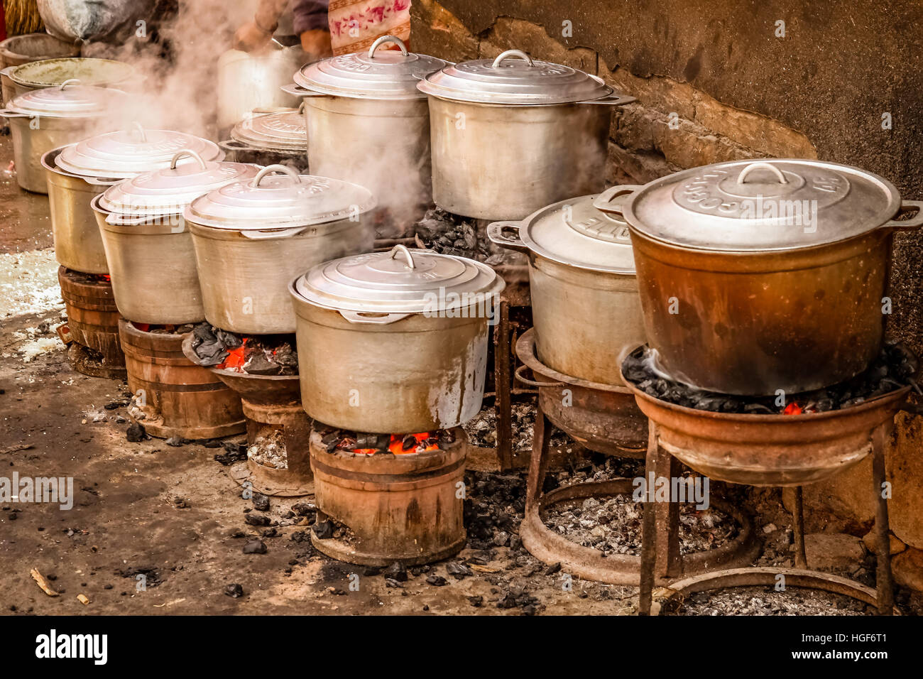 African aluminium cooking pots on the fire Stock Photo Alamy