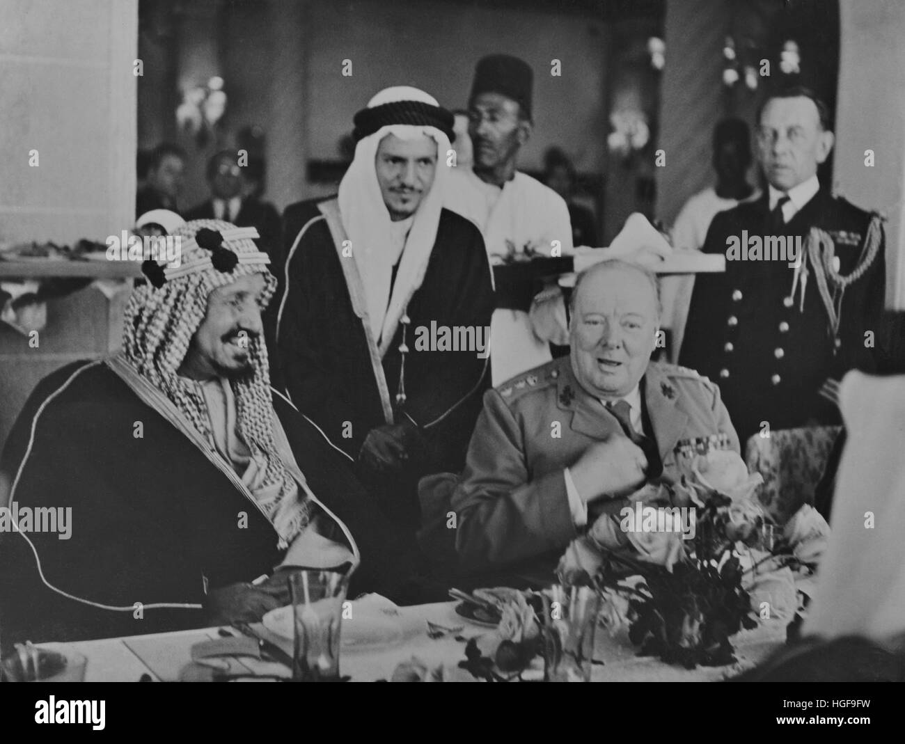 King Ibn Saud of Saudi Arabia attending an official dinner with Winston Churchill. Lake Qaroun, Egypt .February 17th 1945 Stock Photo