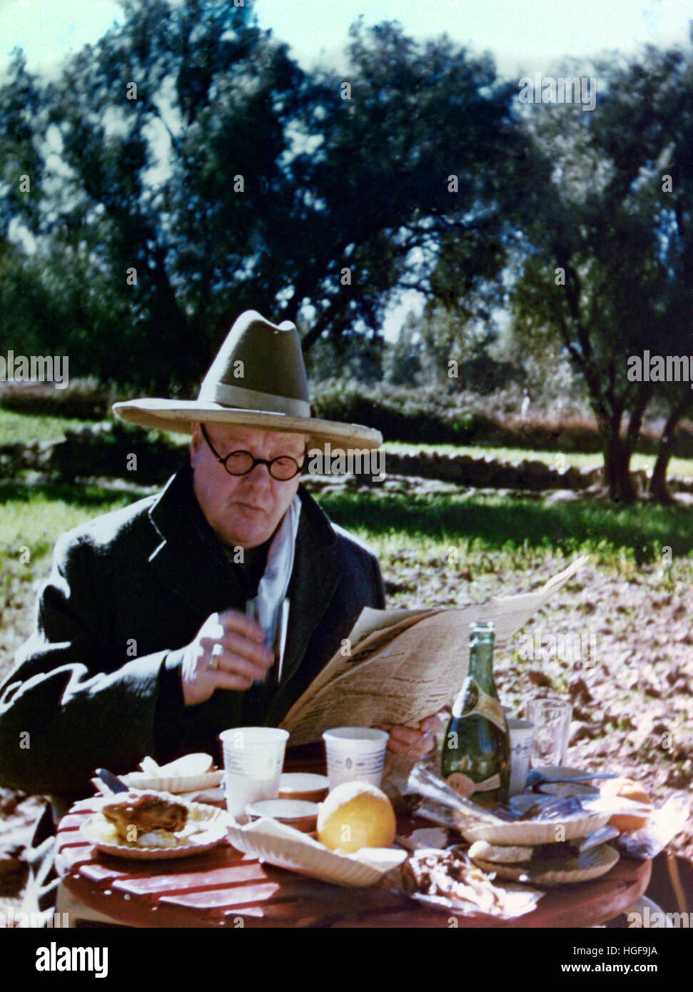 Winston Churchill enjoying an al fresco lunch. in the South of France.1950 Stock Photo