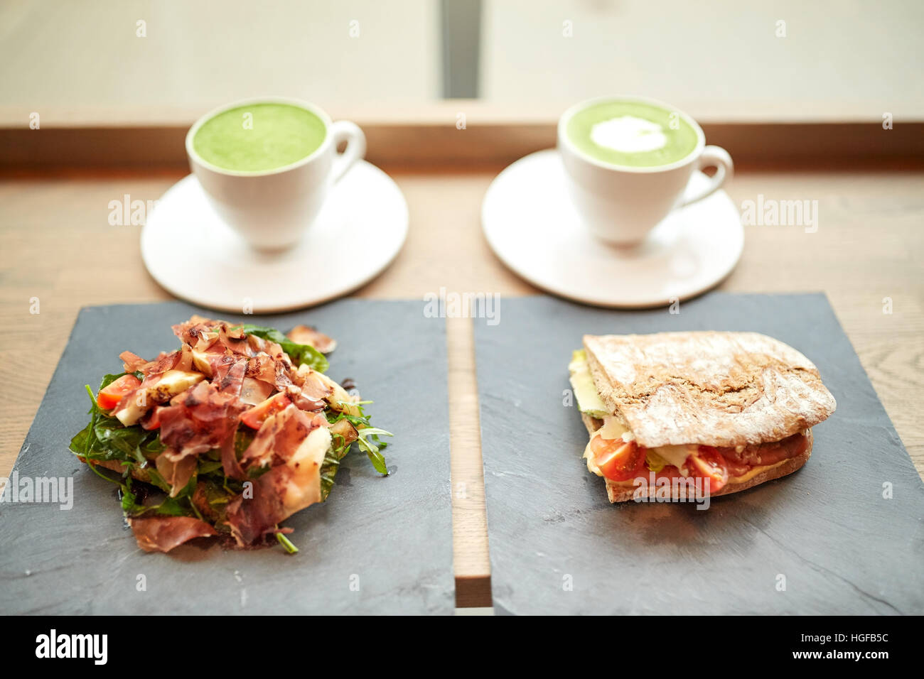 salad, sandwich and matcha green tea at restaurant Stock Photo Alamy