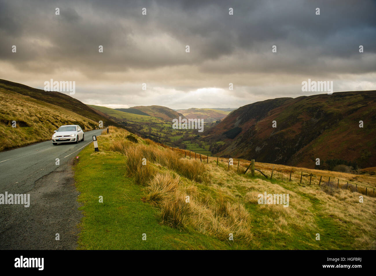 The Berwyn Hills landscape A car driving on the B4391 road on the