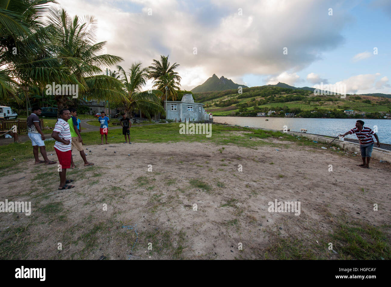 Mauritian men playing a game of boule in Bambous Virieux, Mauritius. Stock Photo