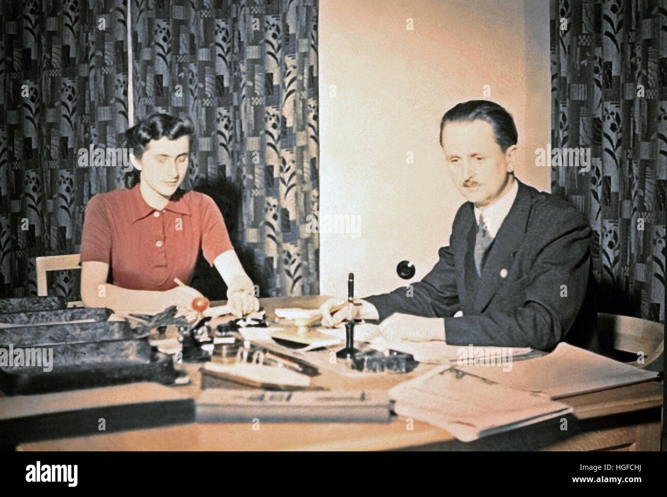 Ghetto Lodz, Litzmannstadt, Walter Genewein the Financial Director of the ghetto at his desk, Poland1942, World War II, Stock Photo