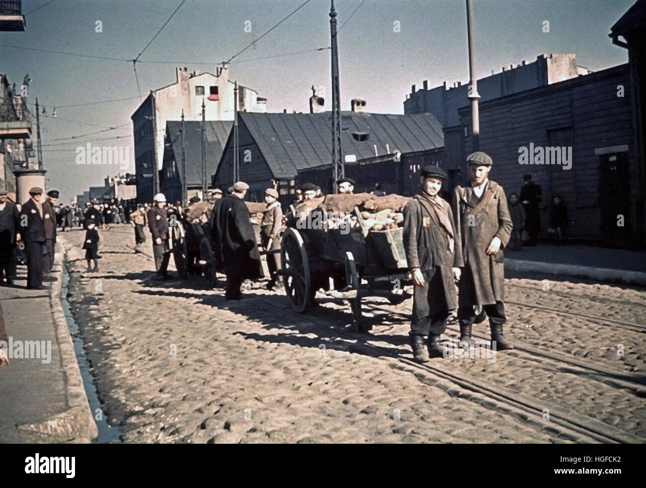 Ghetto Lodz, Litzmannstadt, Young men transporting goods using hand carts, Poland 1942, World War II, Stock Photo