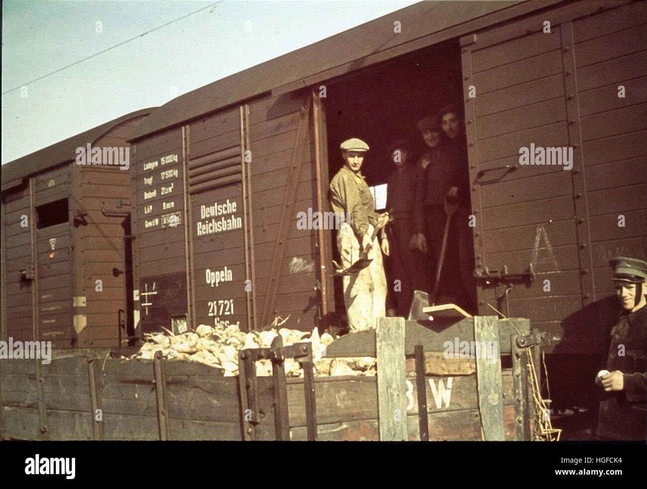 Ghetto Lodz, Litzmannstadt, Jews from Lodz are unloading a boxcar at the Radegast train station outside the ghetto, Poland 1942, World War II, Stock Photo