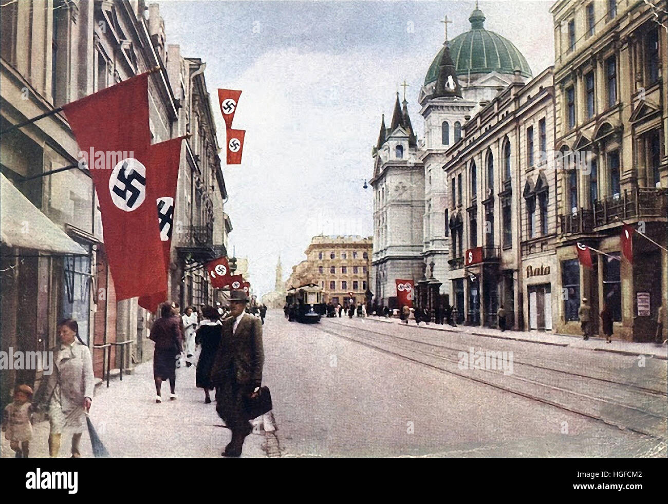 Ghetto Lodz, Litzmannstadt, Nazi flags in the Old Town of Lodz near the Catholic Church Of Pentecost, Poland 1942, World War II, Stock Photo