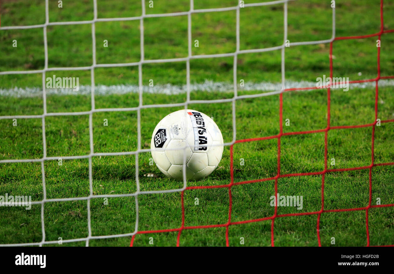 Sport, football, soccer, symbol, concepts, ball in the gate, goal line, net Stock Photo