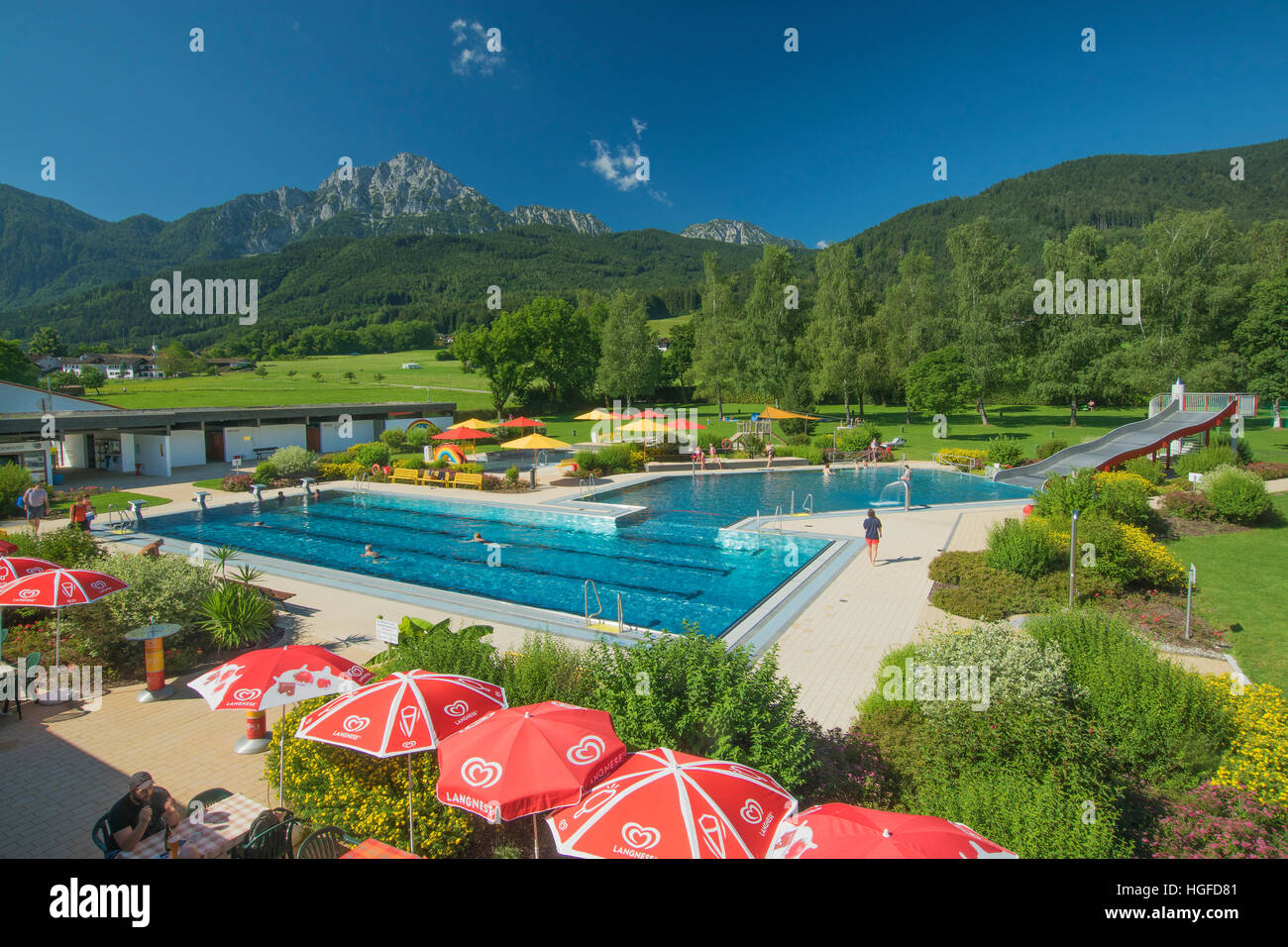 the Staufenbad swimming-pool in Aufham with the Hochstaufen in the background Stock Photo