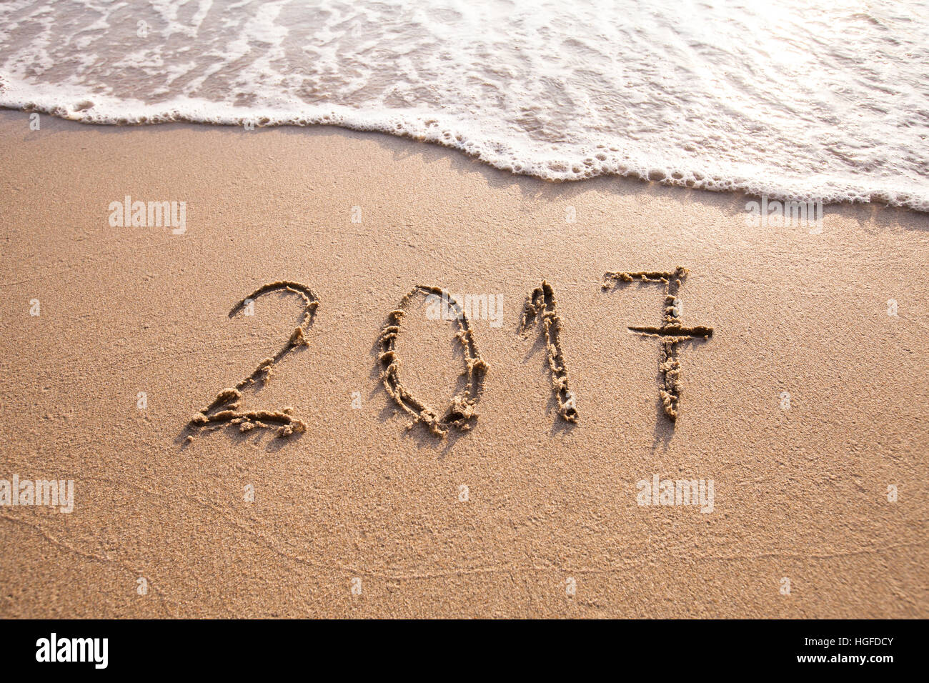 2017 drawn on the sand beach, new year concept Stock Photo