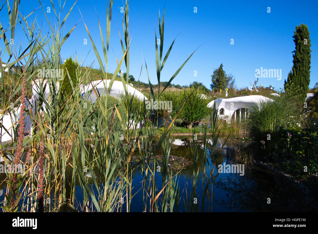 earth houses with Teich Stock Photo Alamy