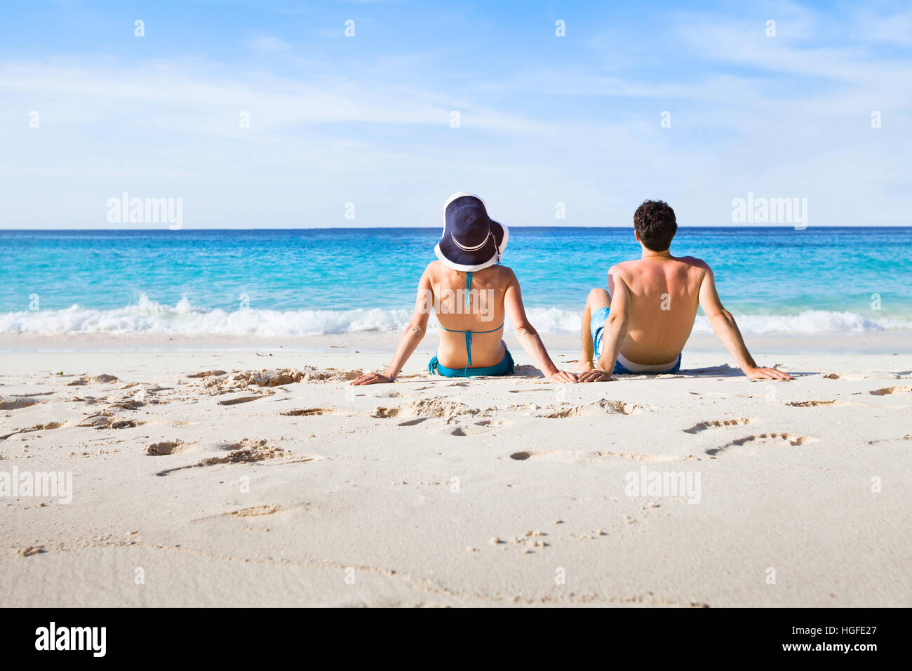 couple relaxing on paradise beach Stock Photo