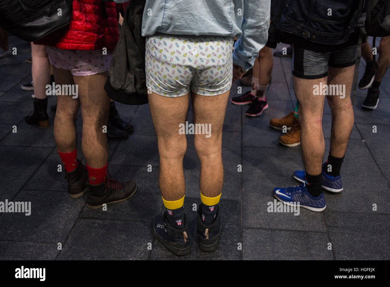 Over 100 Londoners took part the in 2017 No Trousers Tube Ride on the London Underground. This annual event, the 8th, originated in New York as the No Pants Subway Ride. Participants travelled in their underpants. This year a Mannequin Challenge was included which took part on the concourse of King's Cross Station. Stock Photo