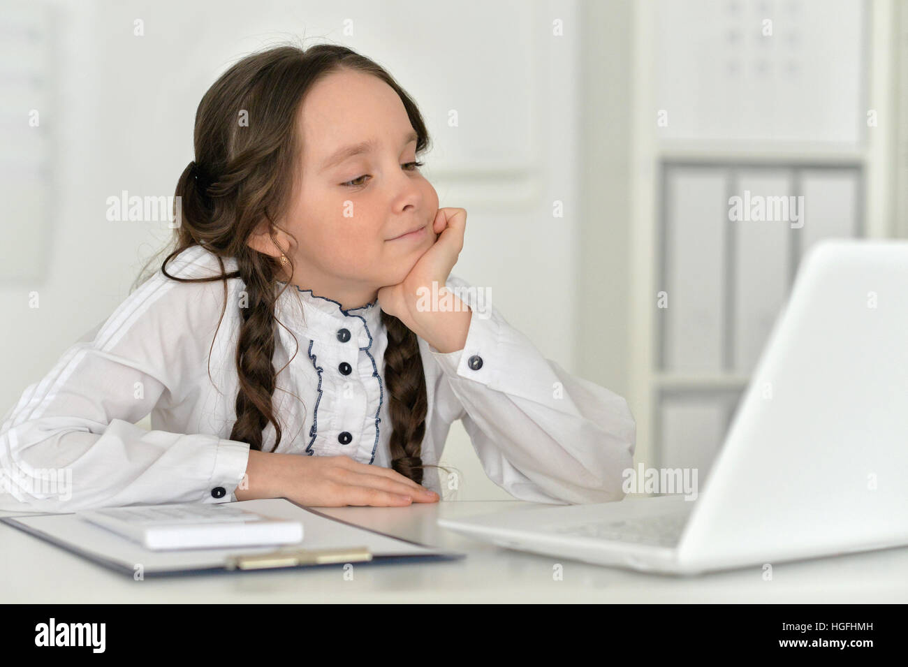 little girl using laptop Stock Photo - Alamy