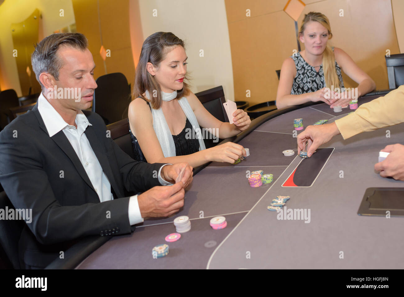 People around casino table Stock Photo