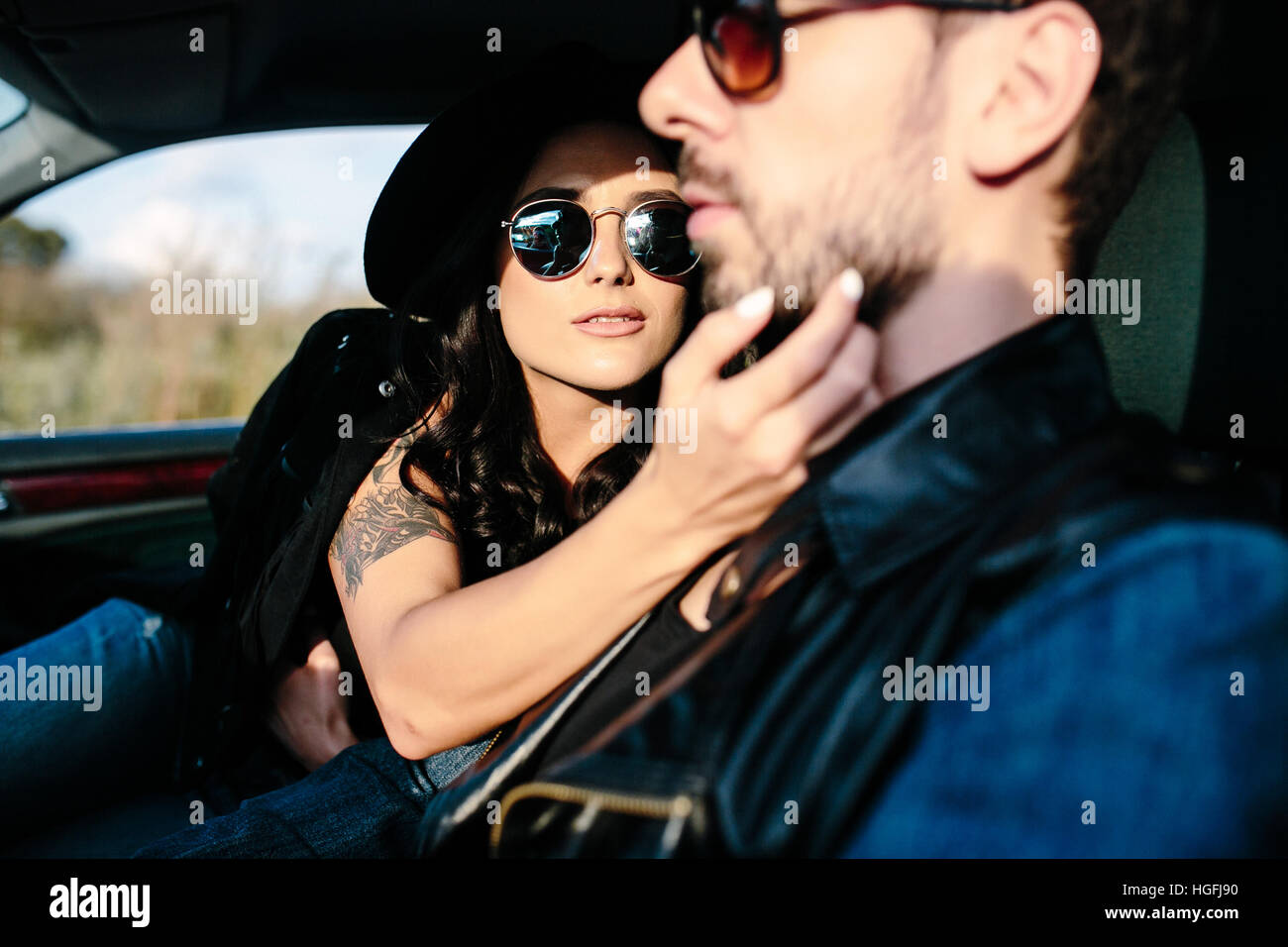 Portrait of young beautiful couple in the car Stock Photo - Alamy