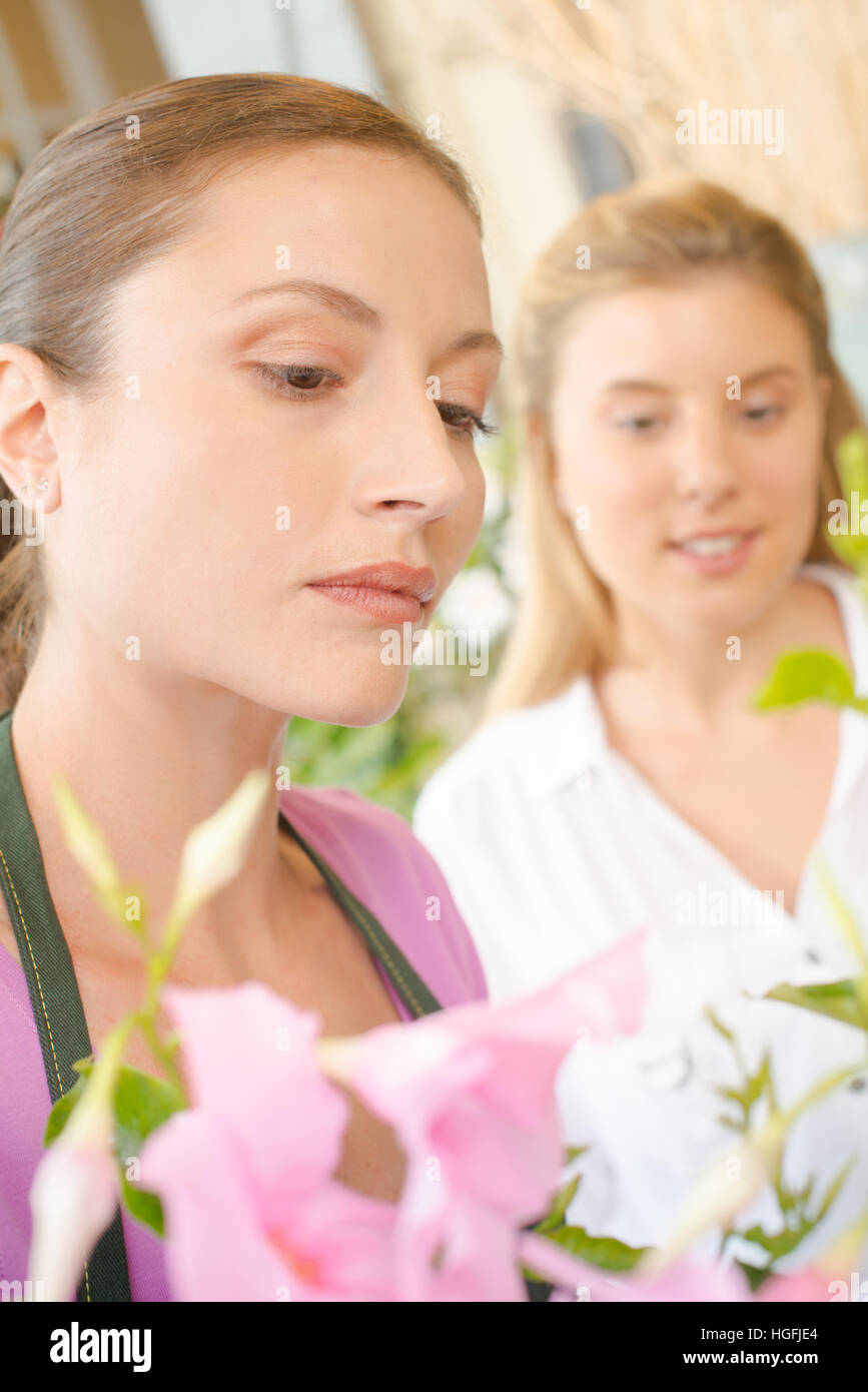 teaching to be a florist Stock Photo Alamy