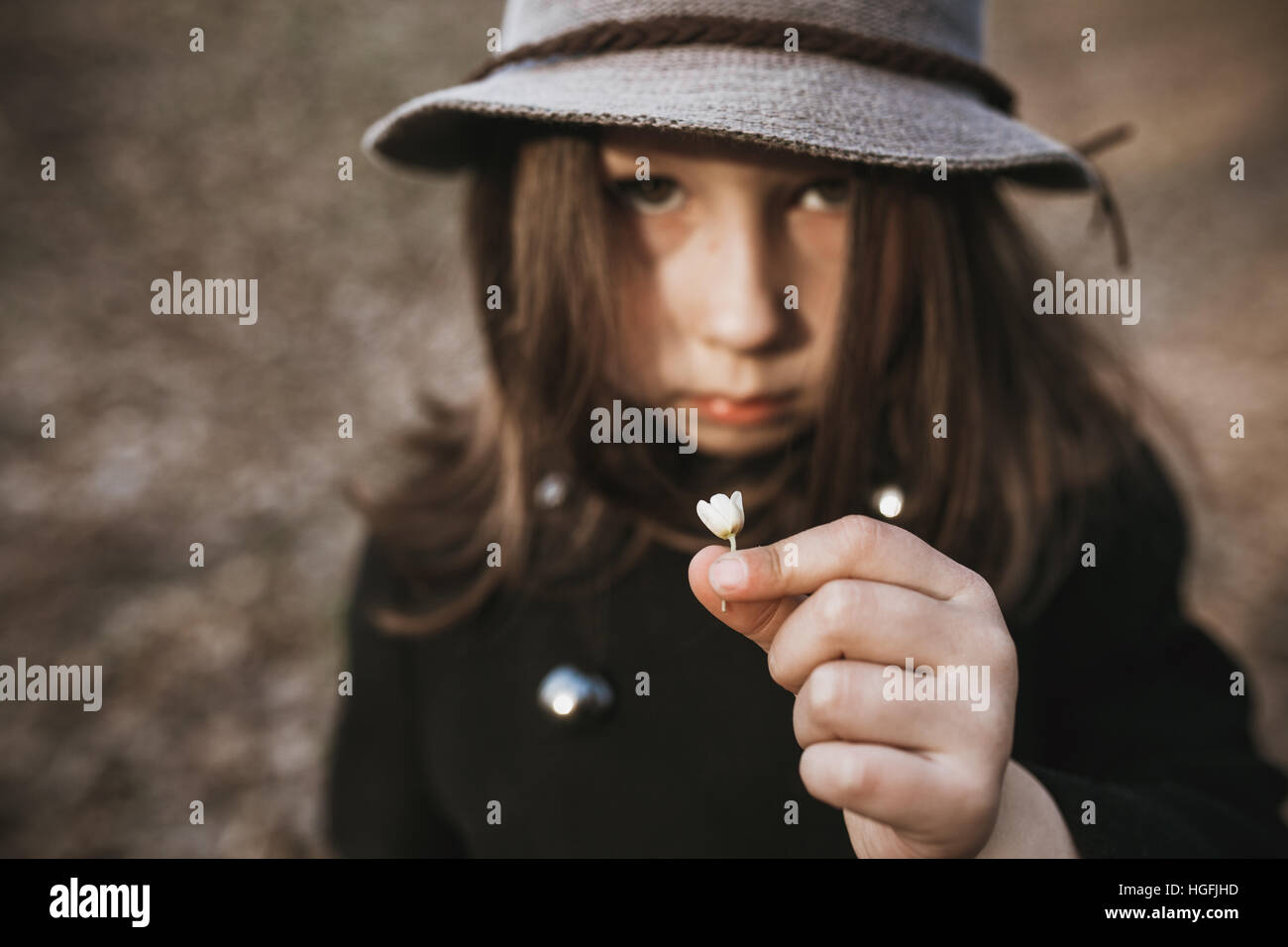 little girl in a black coat and hat Stock Photo - Alamy