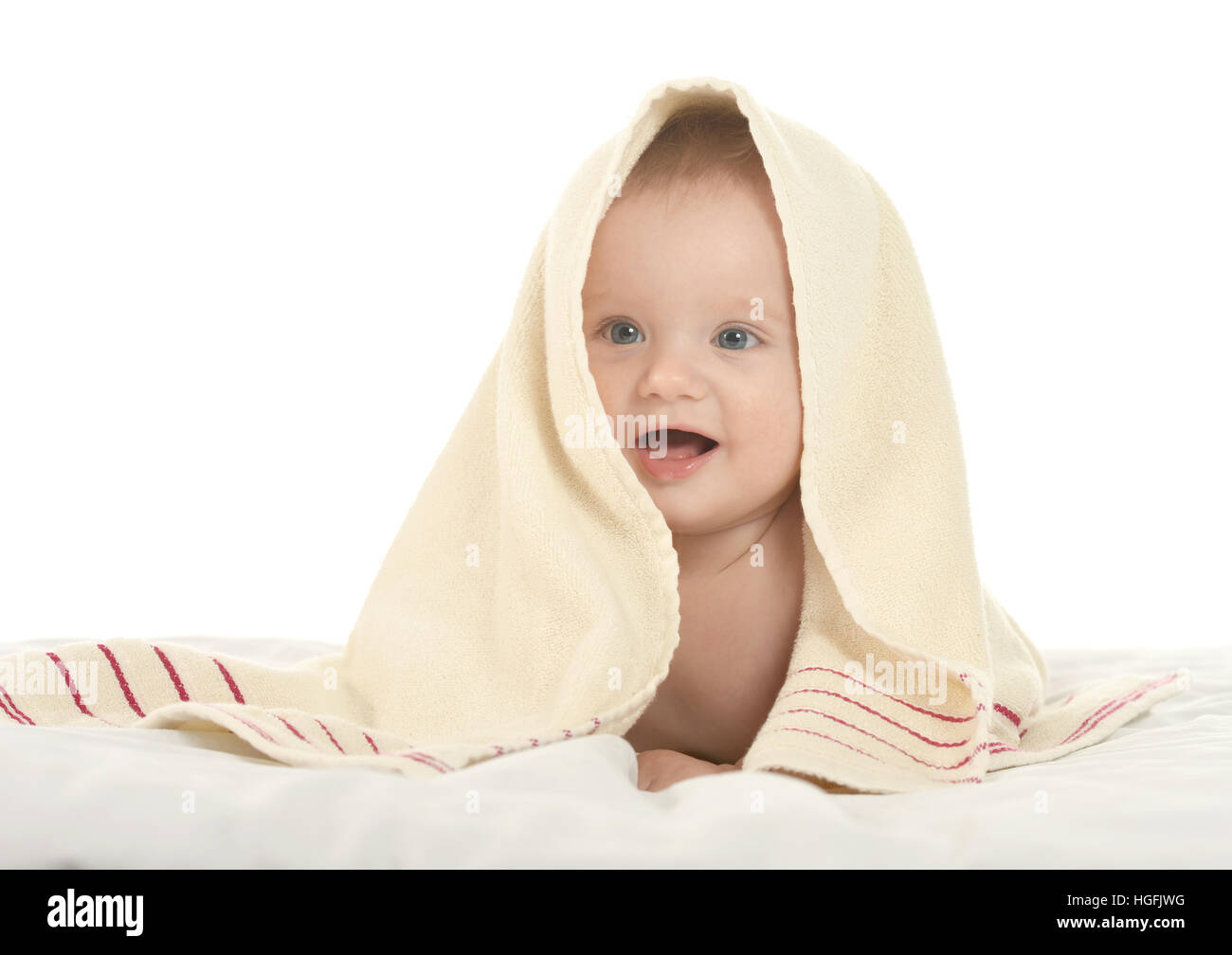 Baby boy lying under blanket Stock Photo Alamy