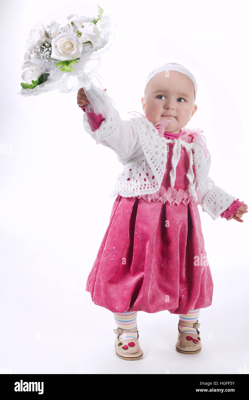 beautiful little girl with bouquet on white Stock Photo - Alamy