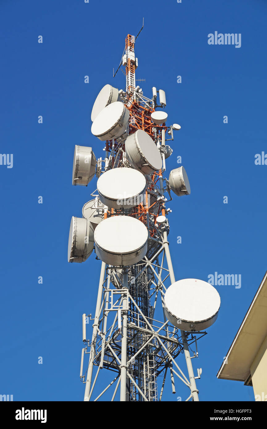 Telecommunication tower with antennas  blue sky Stock Photo