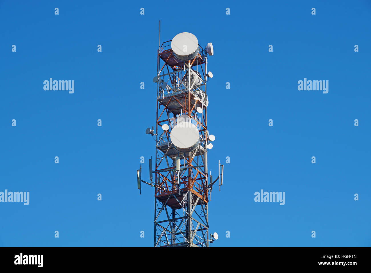 Telecommunication tower with antennas  blue sky Stock Photo